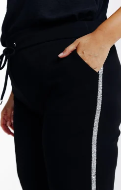 Pantalon style jogging bande paillette