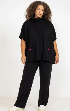 Poncho à poches et boutons colorés