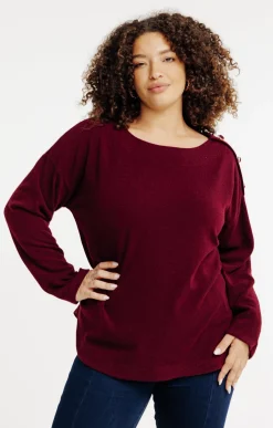 Pull avec boutons en forme de coeur