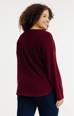 Pull avec boutons en forme de coeur