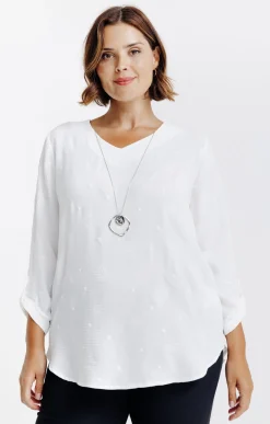 Tunique avec fleurs brodées et collier