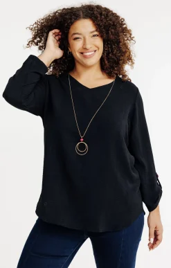 Tunique unie avec boutons colorés